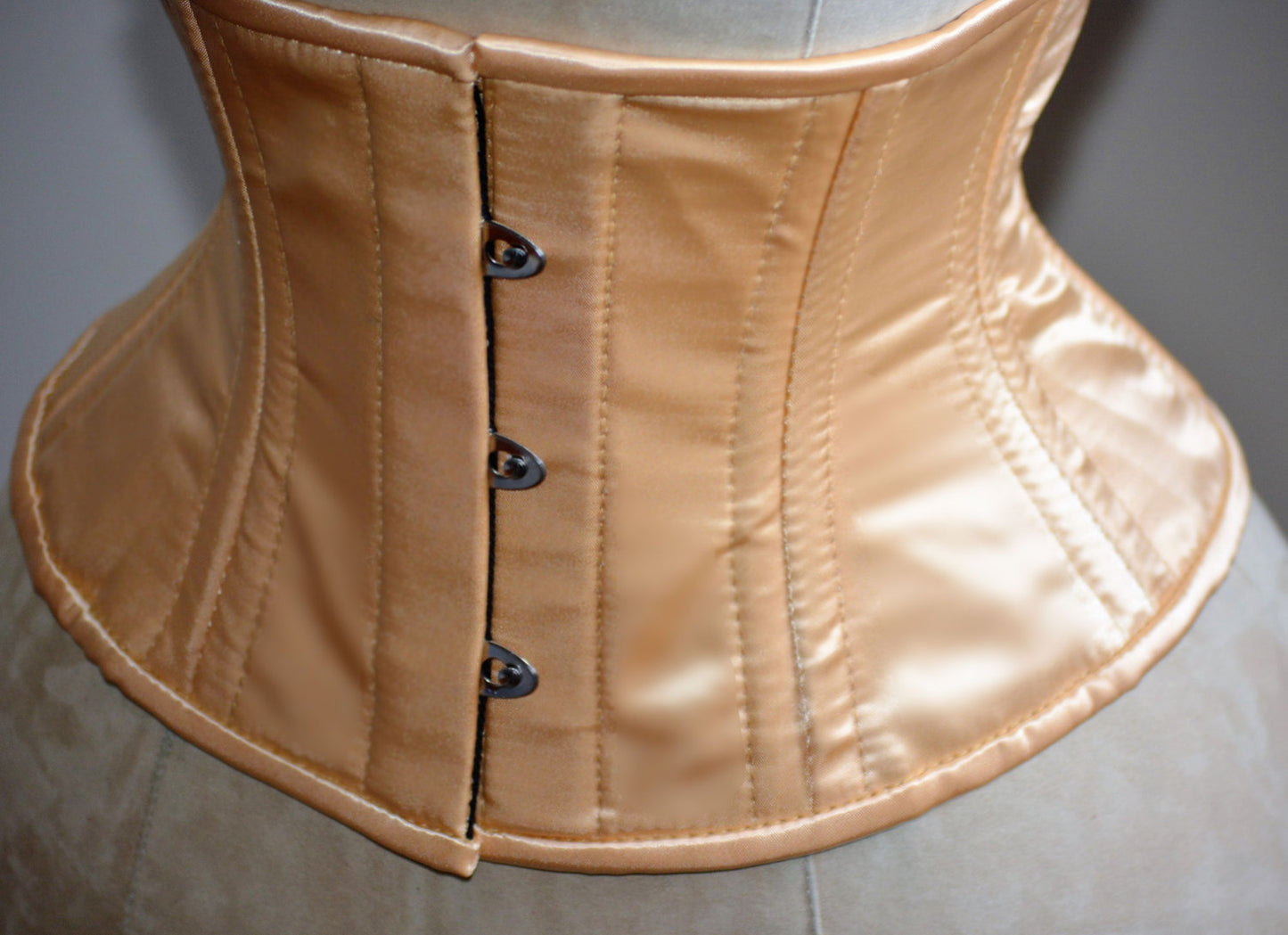 Short nude satin steelboned authentic waspie corset for tight lacing. Steel boned satin corset belt Corsettery