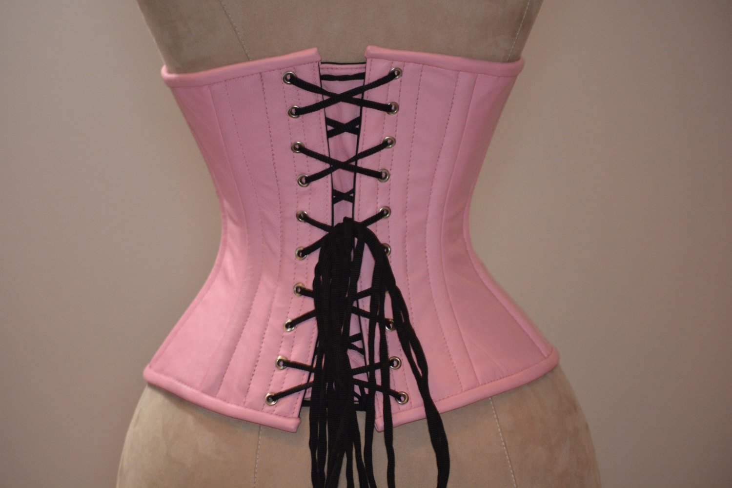 Lambskin waist steel-boned authentic corset of the pale pink color. Corset  for tight lacing and waist training, steampunk, gothic