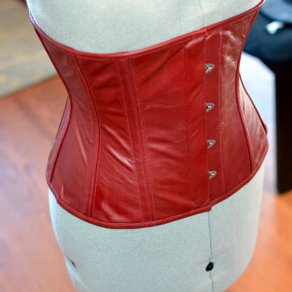 High quality lambskin waist steel-boned authentic corset of dark red color. Corset for tight lacing and waist training, steampunk, gothic Corsettery