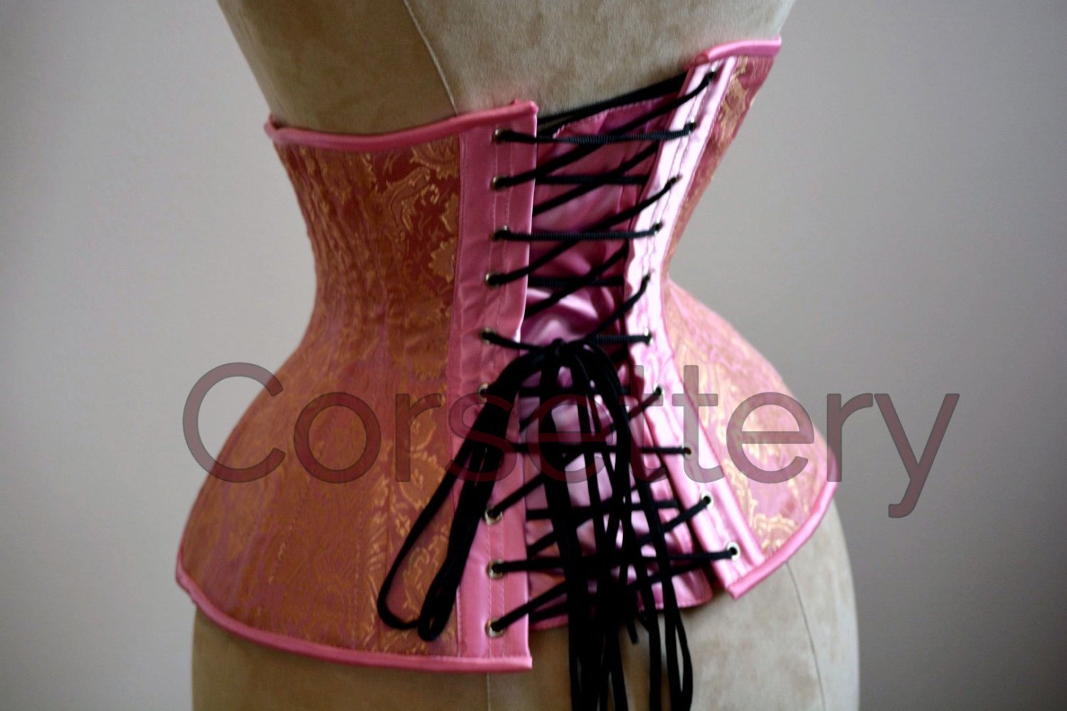 Double row steel boned underbust corset from pink and gold brocade