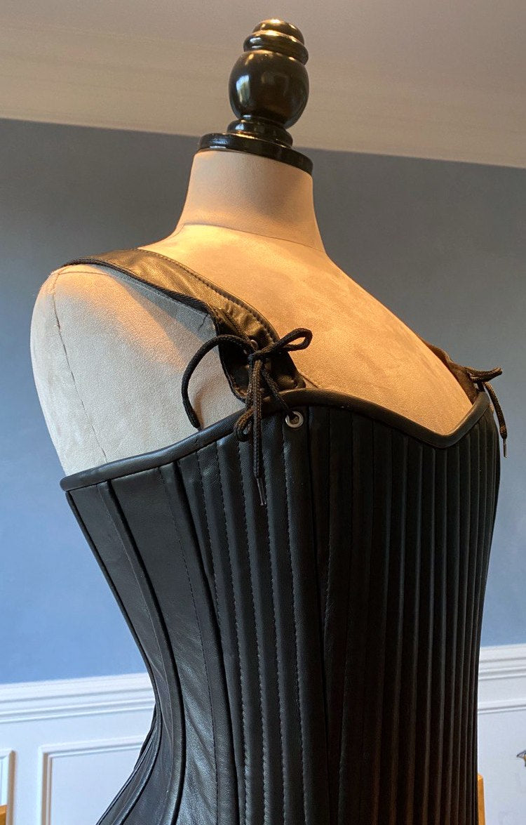 
                  
                    Lambskin full bust vintage historical pattern corset with shoulder straps (40+ steel bones). Different colors of leather are available Corsettery
                  
                