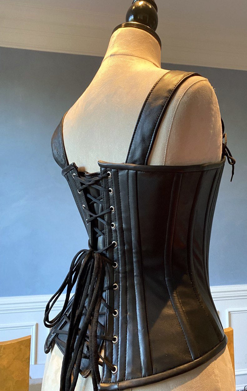 
                  
                    Lambskin full bust vintage historical pattern corset with shoulder straps (40+ steel bones). Different colors of leather are available Corsettery
                  
                