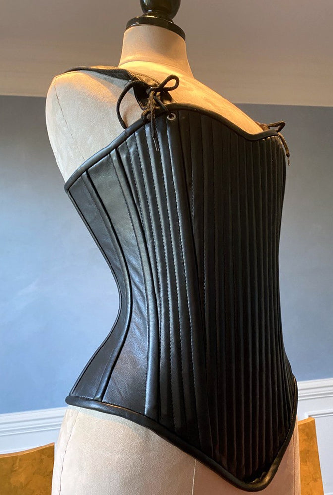 
                  
                    Lambskin full bust vintage historical pattern corset with shoulder straps (40+ steel bones). Different colors of leather are available Corsettery
                  
                