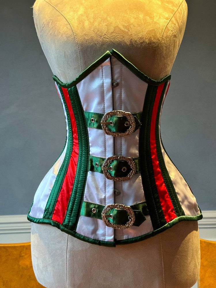 
                  
                    胸下部采用圣诞老人风格的红色和绿色缎子，前面有蒸汽朋克扣钩。紧身胸衣根据您的尺寸量身定制。
                  
                