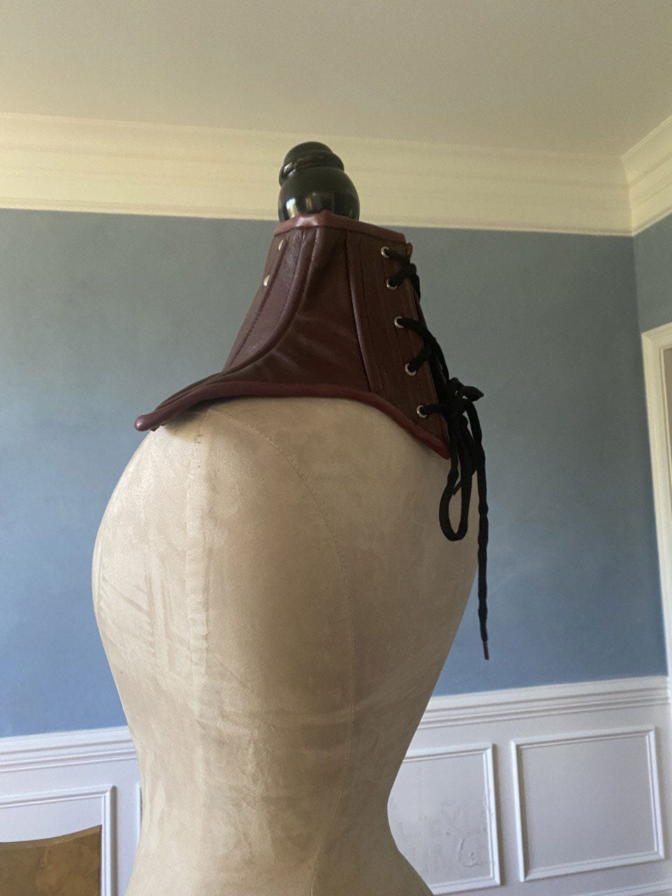 A real leather corsetted collar laced at the back, different