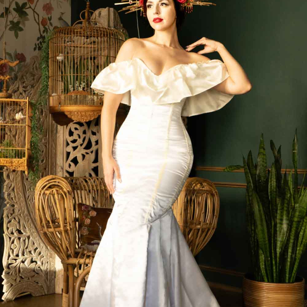 Classic satin corset wedding dress with wide frill. Bespoke steel