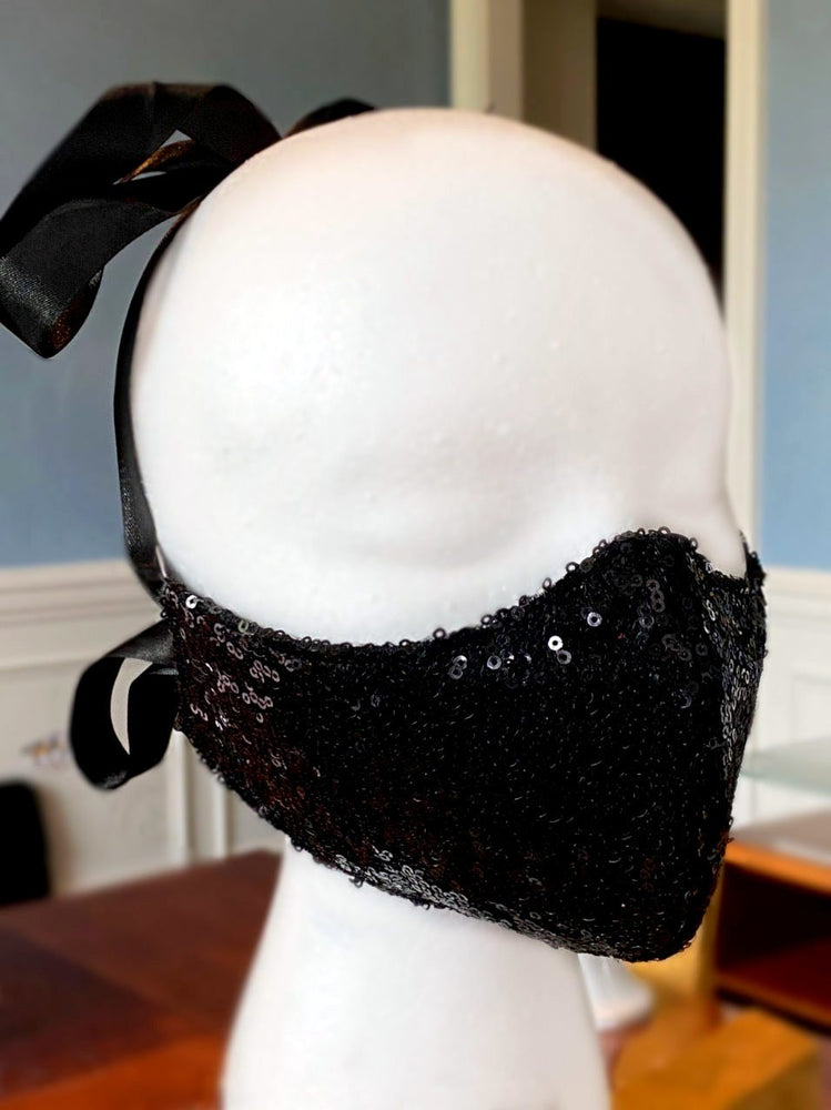 Fashion face cover/cloths face mask, black sequins outside, cotton inside. Around head ribbon Corsettery