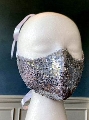 Fashion face cover/cloths face mask, silver sequins outside, cotton inside. Around head ribbon Corsettery
