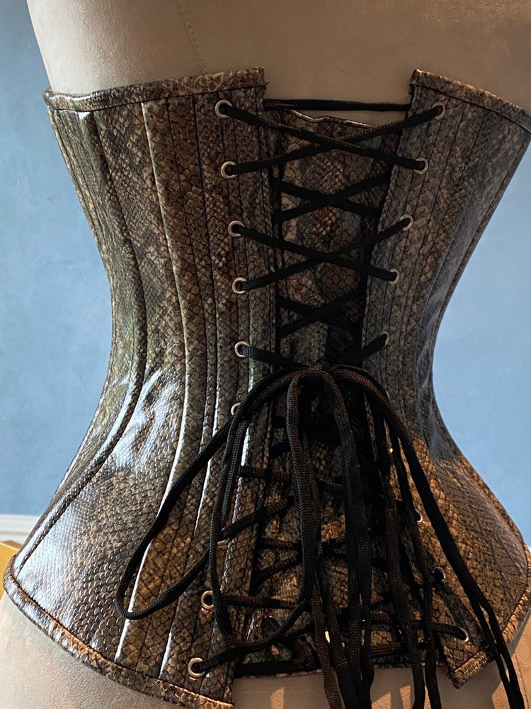 
                  
                    Fake snake leather Edwardian pattern PVC corset. Steelbone custom corset, renaissance, gothic, steampunk, bespoke, victorian Corsettery
                  
                