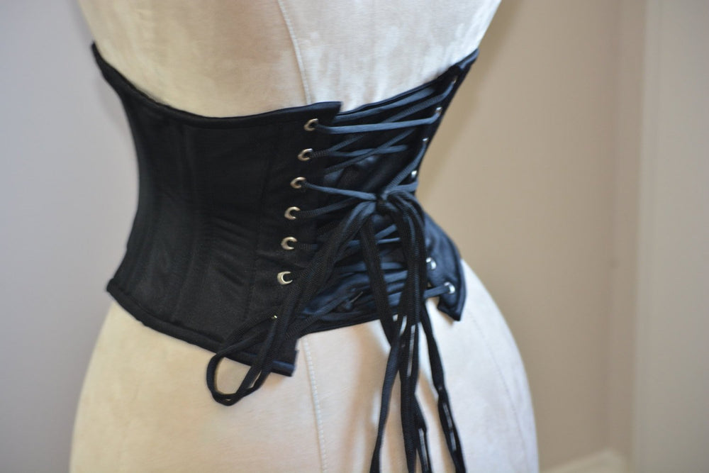 Classic satin steel-boned authentic waspie corset for tight lacing and waist training. Corsettery