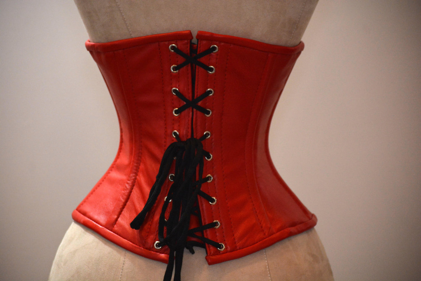 
                  
                    Hand dyed lambskin waist steel-boned authentic corset of red color. Bespoke corset for tight lacing and waist training, steampunk, gothic Corsettery
                  
                