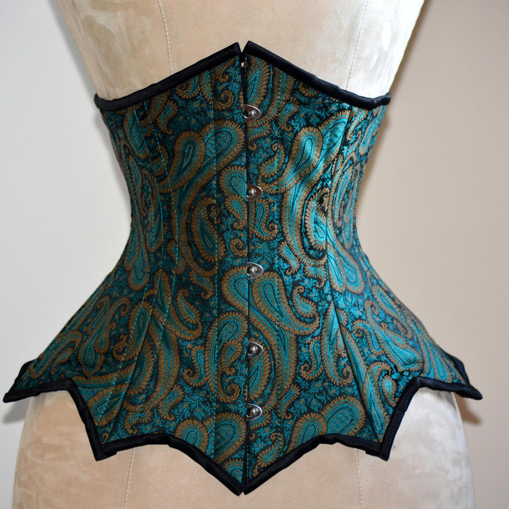 
                  
                    Steel boned underbust corset from green brocade made personally for you. Real waist training corset for tight lacing. Gothic, steampunk Corsettery
                  
                