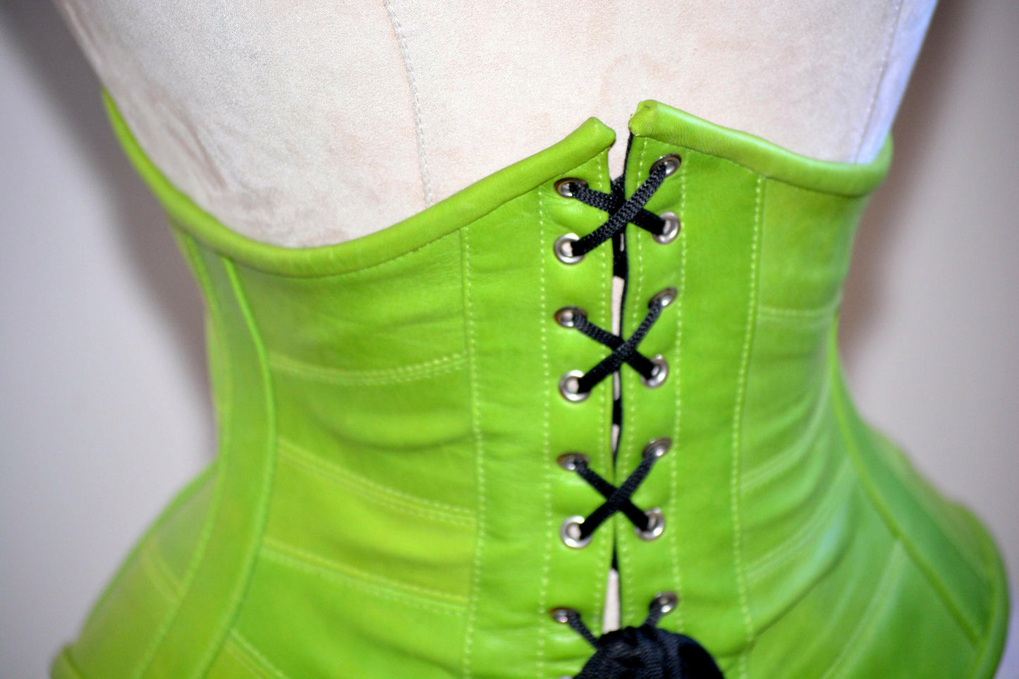 
                  
                    Authentic trendy green steel boned underbust leather corset. Trendy fashion green belt from leather Corsettery
                  
                
