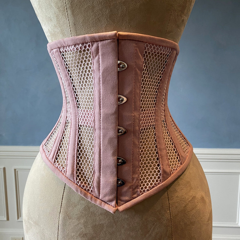 
                  
                    Real steel boned underbust underwear pink corset from transparent mesh and cotton. Real waist training corset for tight lacing. Corsettery
                  
                