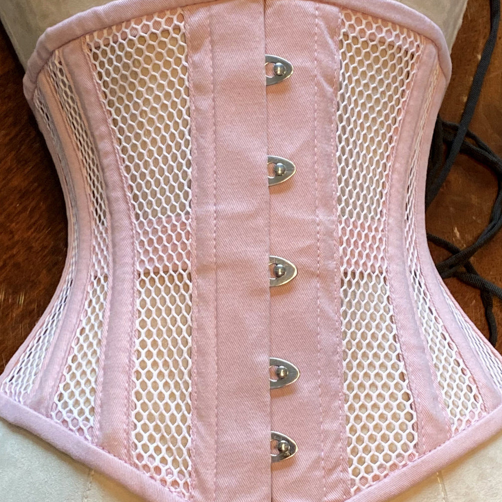 
                  
                    Real steel boned underbust underwear pink corset from transparent mesh and cotton. Real waist training corset for tight lacing. Corsettery
                  
                