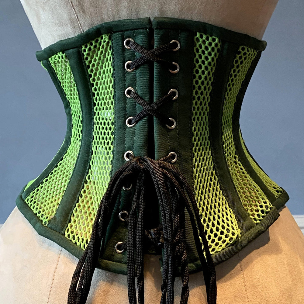 
                  
                    Real steel boned underbust underwear green corset from transparent mesh and cotton. Real waist training corset for tight lacing. Corsettery
                  
                