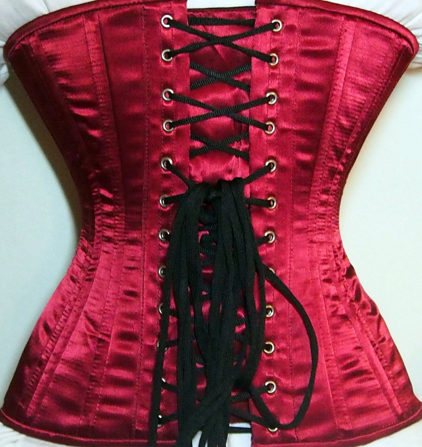 
                  
                    Exclusive red and black corset covered by laces. Lace Addicted Corsettery collection. Gothic, custom made, steampunk, waist training corset Corsettery
                  
                