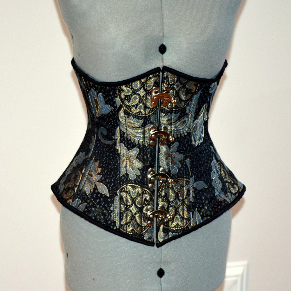 Steel boned underbust steampunk corset from brocade with golden pattern with steampunk hooks. Real waist training corset for tight lacing. Corsettery