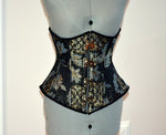 Steel boned underbust steampunk corset from brocade with golden pattern with steampunk hooks. Real waist training corset for tight lacing.