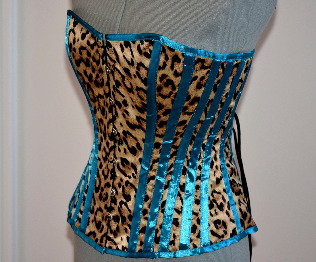
                  
                    Cheetah and blue satin steel-boned animal print crazy authentic corset. Bespoke made to your measurements. Affordable cheap waist training Corsettery
                  
                