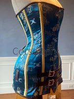 Exclusive blue brocade corset in caftan style, colorful blue with brown leather steampunk and all black gothic available Corsettery