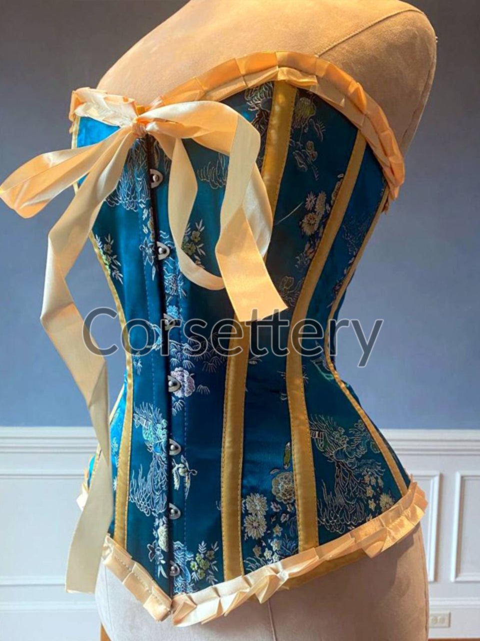 Bright blue brocade steampunk corset with ribbons and bow. Steel-boned –  Corsettery Authentic Corsets USA