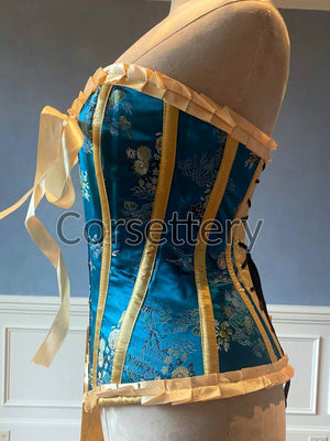 Bright blue brocade steampunk corset with ribbons and bow. Steel-boned corset for tightlacing. Prom, gothic, steampunk Victorian corset. Corsettery
